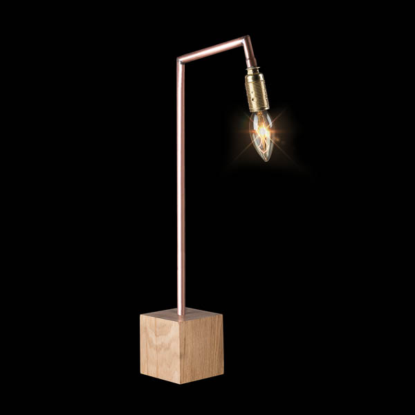 Packshot sur fond noir d'une lampe design